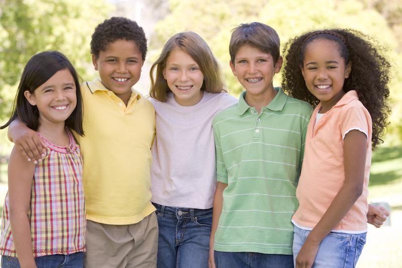 A group of children smiling at Washington Park in Springfield IL