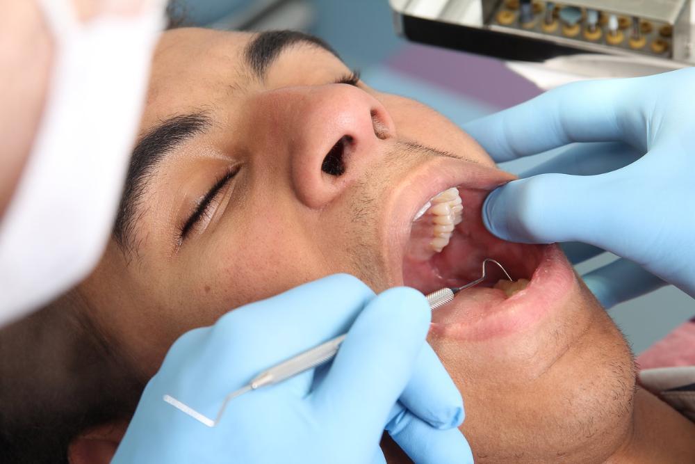 man getting dental exam & cleaning in Springfield IL