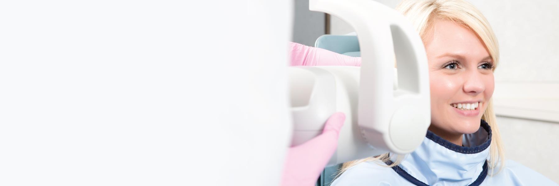 Woman at Springfield dentist office for exam and cleaning