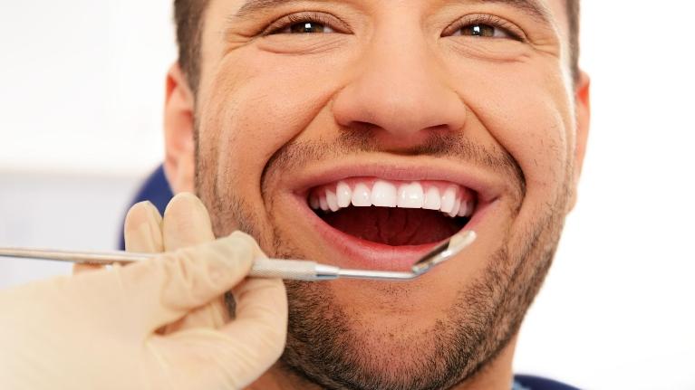 Man at Dentist | Ruggless Dental