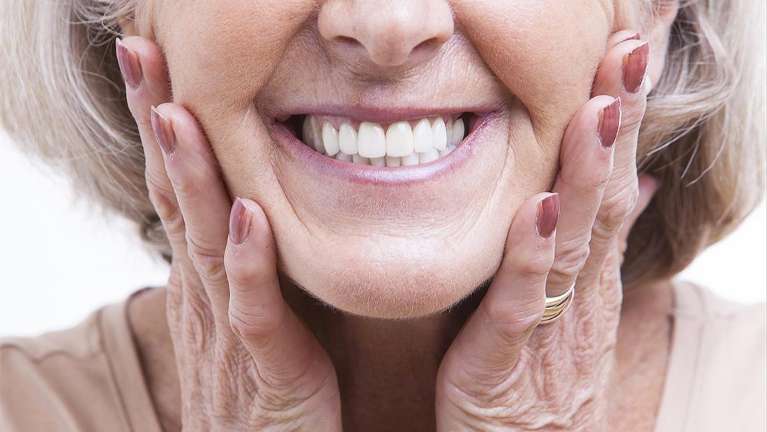 woman with dentures in springfield, il