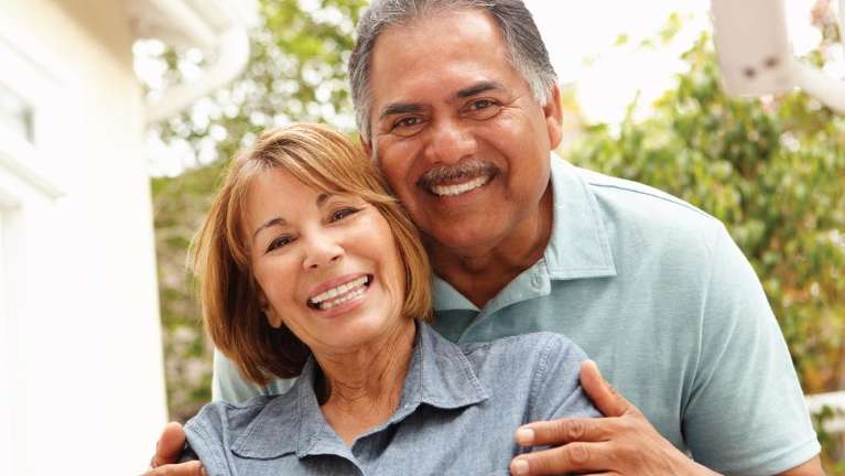 Couple with beautiful smile | Dental Bridges in Springfield, IL