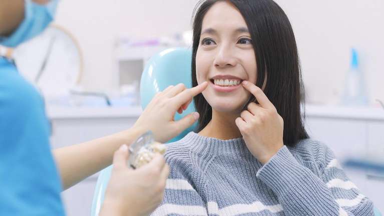 woman getting dental checkup